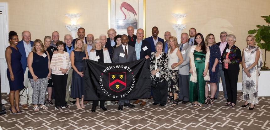 Wentworth Alumni pose for the camera at a Naples, FL event