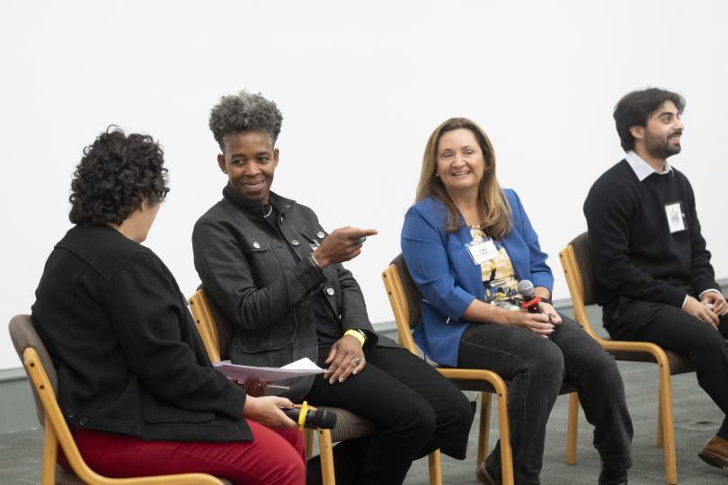A group of people sitting in chairs